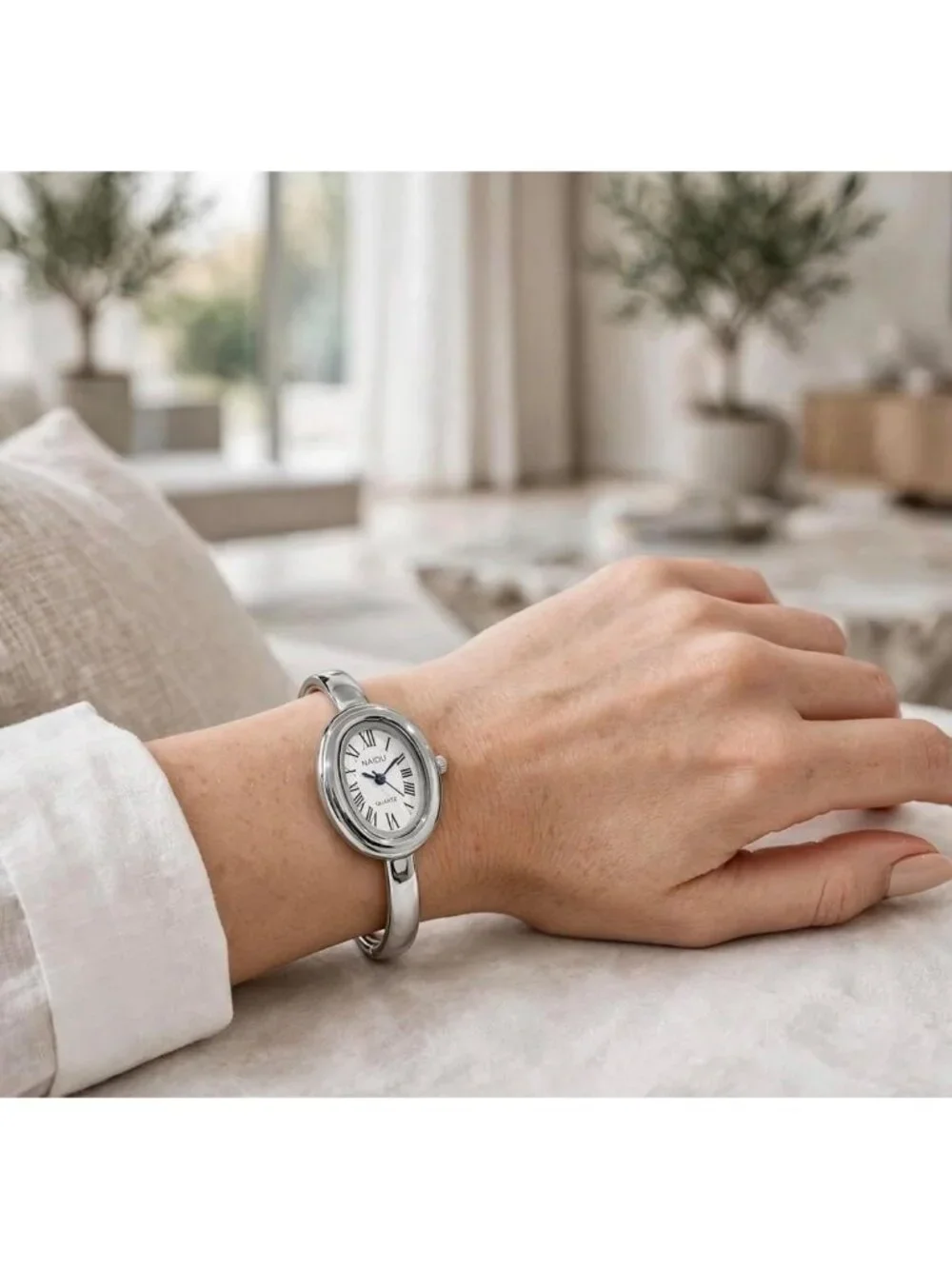Women's Silver Bangle Bracelet Oval Dial Roman Numeral Elegant Style Wrist Watch
